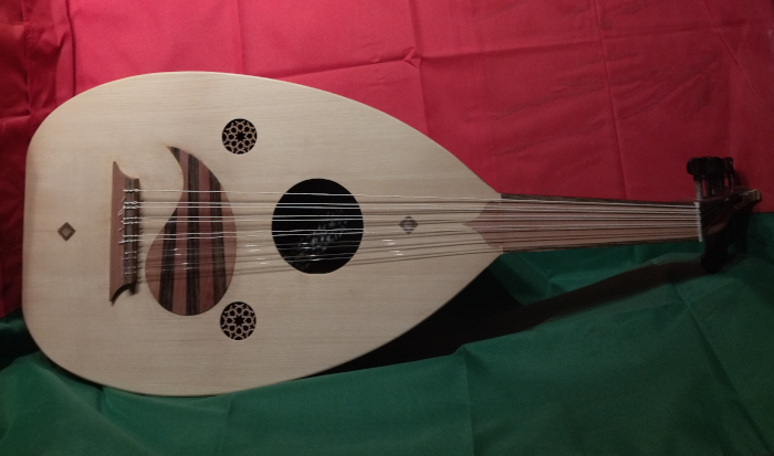 Front view of Shahed model oud with alternative 'paisley' raqma (pickguard) design.